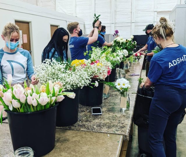 AdShark team making flower bouquets